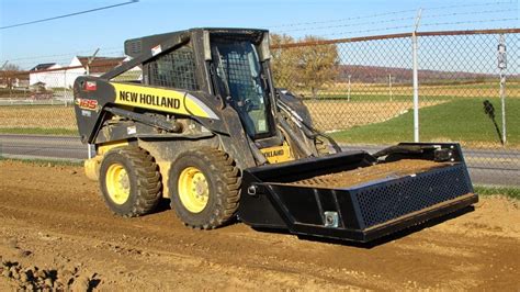 cat skid steer power rake|best skid steer power rake.